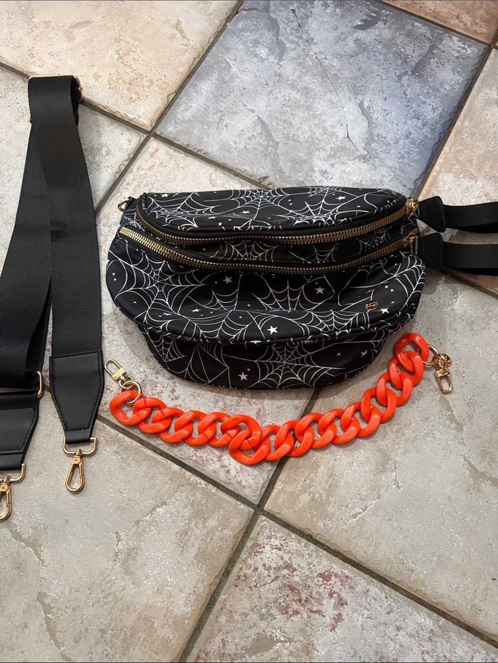Gold Blush Black Spiderweb Print Crossbody Bag with Orange Chain Accent